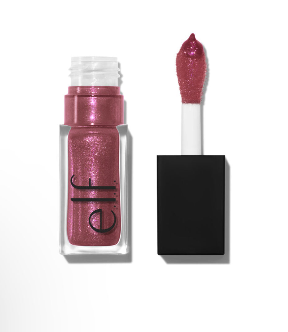 Lip oil with shimmer for glowing finish