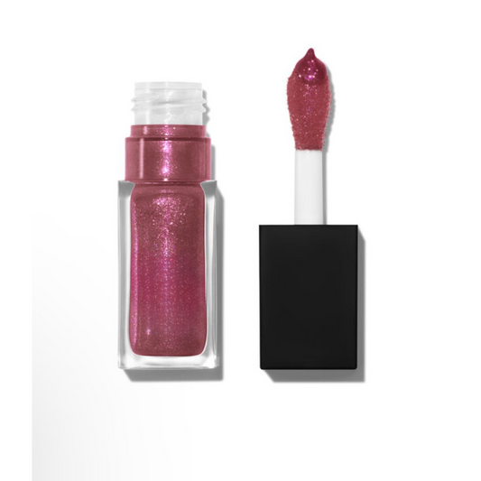 Lip oil with shimmer for glowing finish
