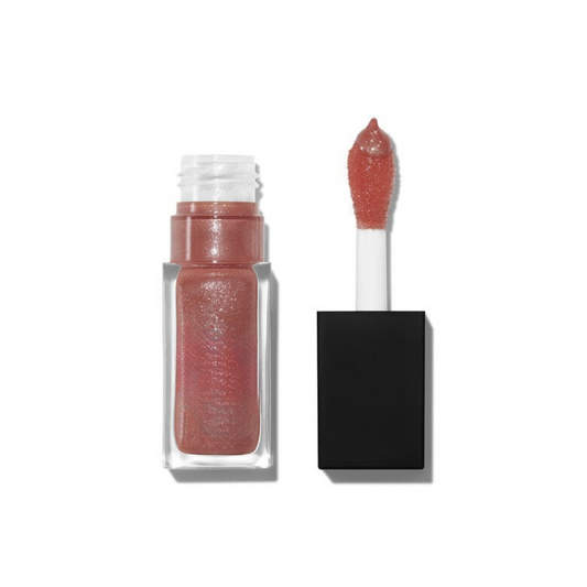 Lip oil with shimmer for glowing finish